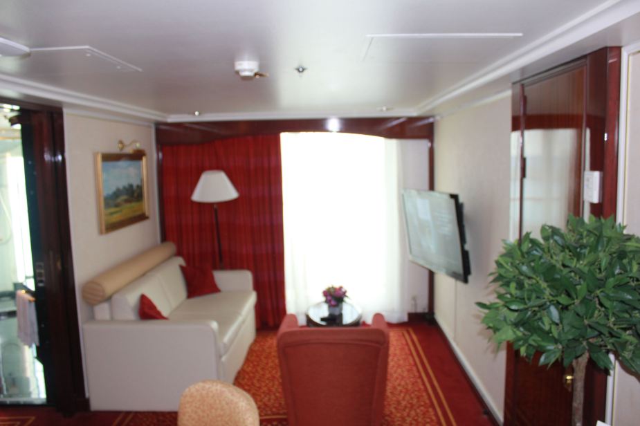 From the bar seating area to the living room area with the balcony door