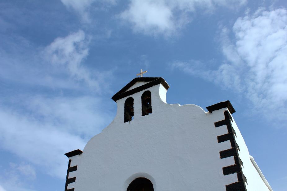 So, where we had lunch, during the 1730s as the lava was flowing to in the direction of this village. The villagers would bring images of the Virgin Mary in front of the lava hoping she would save them. One day during this ceremony, a small boy fell into a newly created fissure, and a woman in white whom the villagers had never seen came out of the fissure carrying the little boy and the advancing lava flow eventually stopped. As a result, the villagers thought the Virgin Mary had saved them, erected the church and inside is a statue called the Virgin of the Volcanoes. We did not go inside as they were having a church service while we were there....but, a cool story nonetheless.