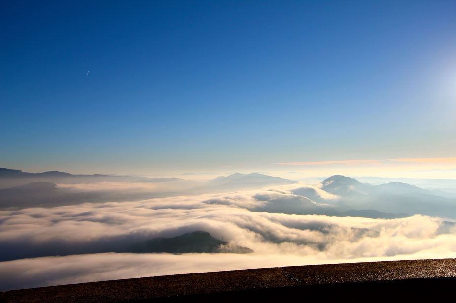 Then, at the top, it looks as it we are floating on clouds with the fog below.