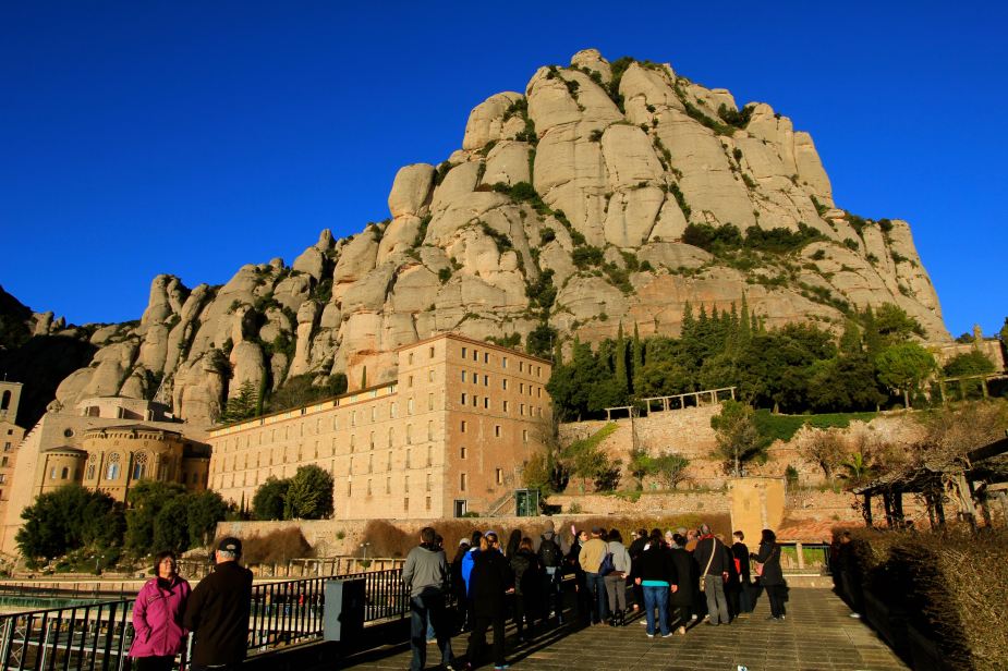 The building in the foreground of the mountain is the Montserrat Abbey, which is a Benedictine Monastery built in the 6th Century.
