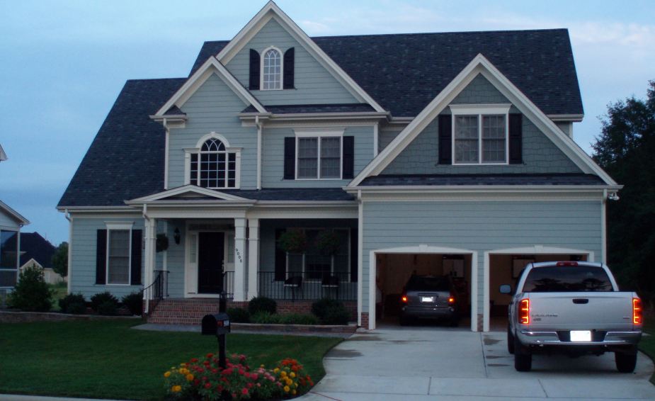 This was our home in the US in North Carolina. Note the front yard. This house was about 3,000 square feet of space (278 square meters). We lived in a sub-division outside of Raleigh, NC, and in our sub-division there were about 10 different architectural styles you could choose from. Also, because of the wood construction, an internet wifi signal was able to be received anywhere in the house without any extenders.