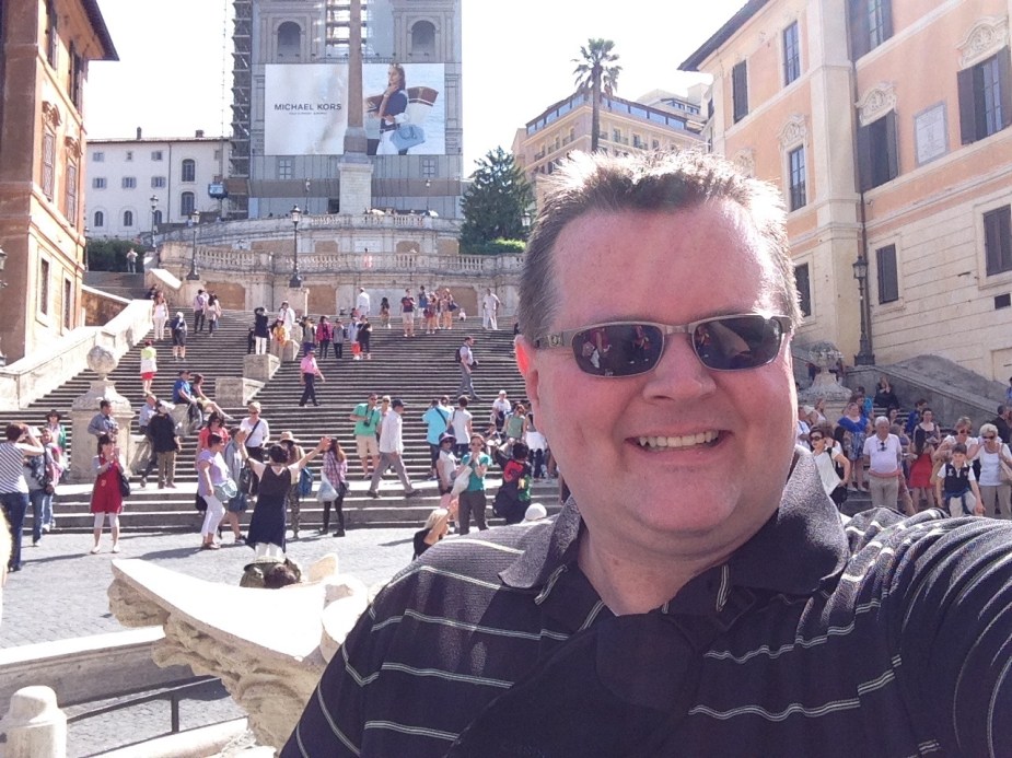 At the bottom of the Spanish Steps. Our last visit to Rome was in mid April 2013, and the temperature was about 10 degrees Fahrenheit warmer this time. It is early morning (10am is early in Rome), so the Steps are not crowded. But, by late afternoon, hundreds of people will be here sitting on the steps people watching. 