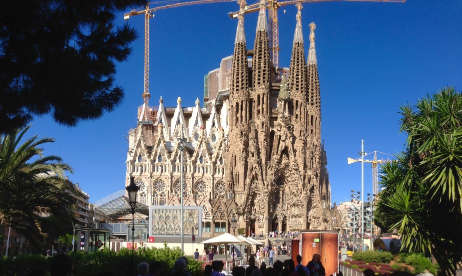 So...most really large cathedrals in Europe are very old and built centuries ago. This one, the Basilica of the Holy Family (Sagrada Familia in Spanish) is still under construction. Started in 1882 and designed by the famous architect Antoni Gaudi, Gaudi oversaw construction until his death in 1926, when it was about 1/4 complete. In 2010, it was 50% complete and it is projected to be finished in 2026 (100 years after Gaudi's death).