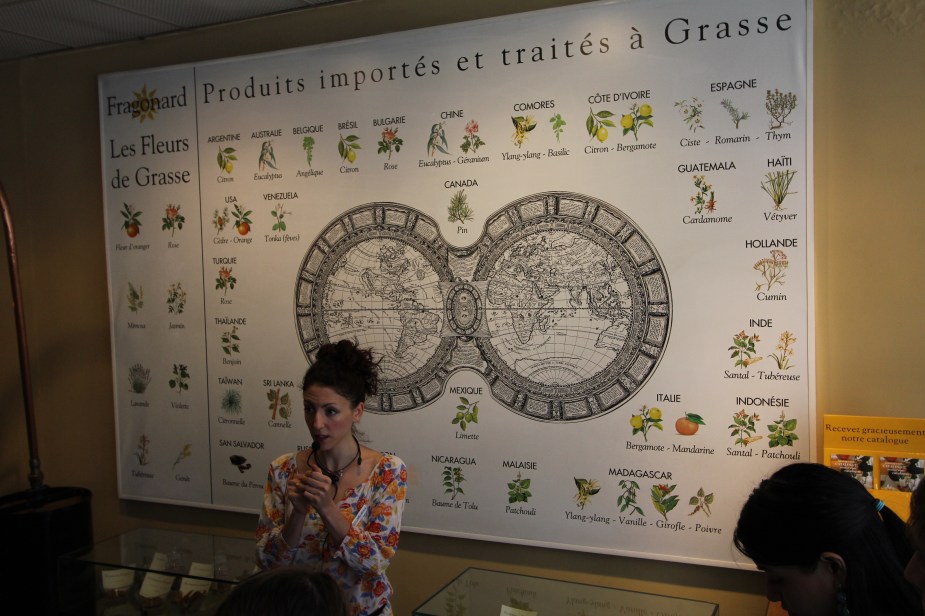 At the Fragonard Perfume Factory in Grasse, France, with our guide explaining how flowers & spices from around the world are used in the making of perfumes and soaps with some taking up to 250 different types just for one perfume scent.