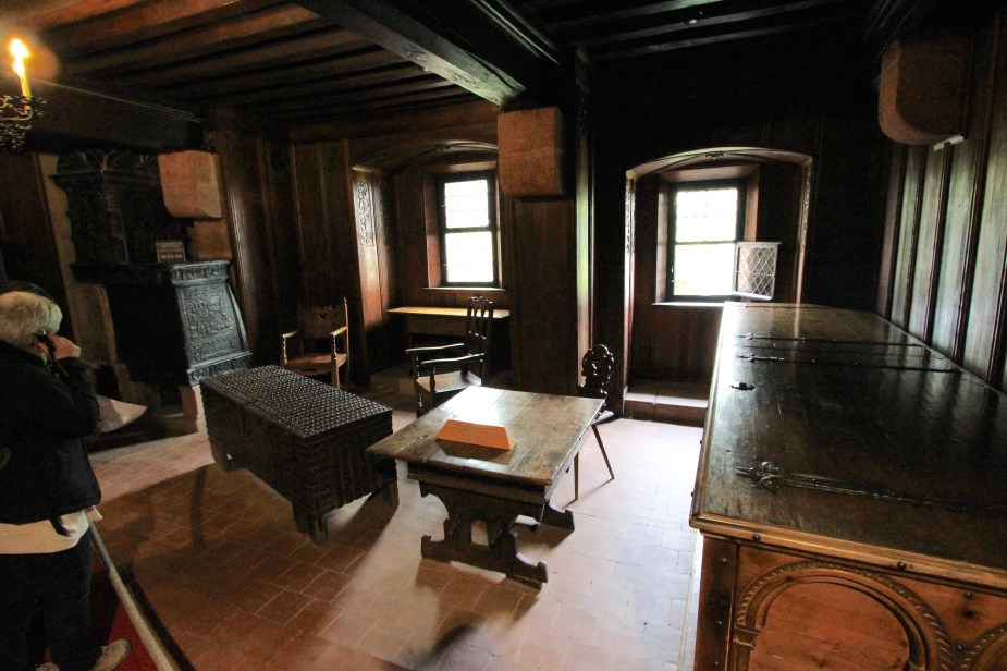 Inside one of the living spaces with replica, period furnishings.